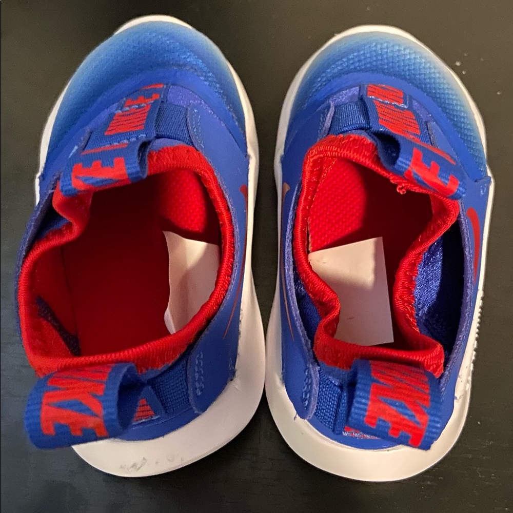 Blue and red Nike. Toddle boy size 5.